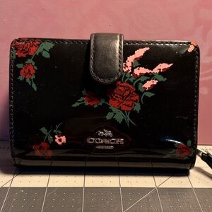 Coach black patent leather wallet with floral print